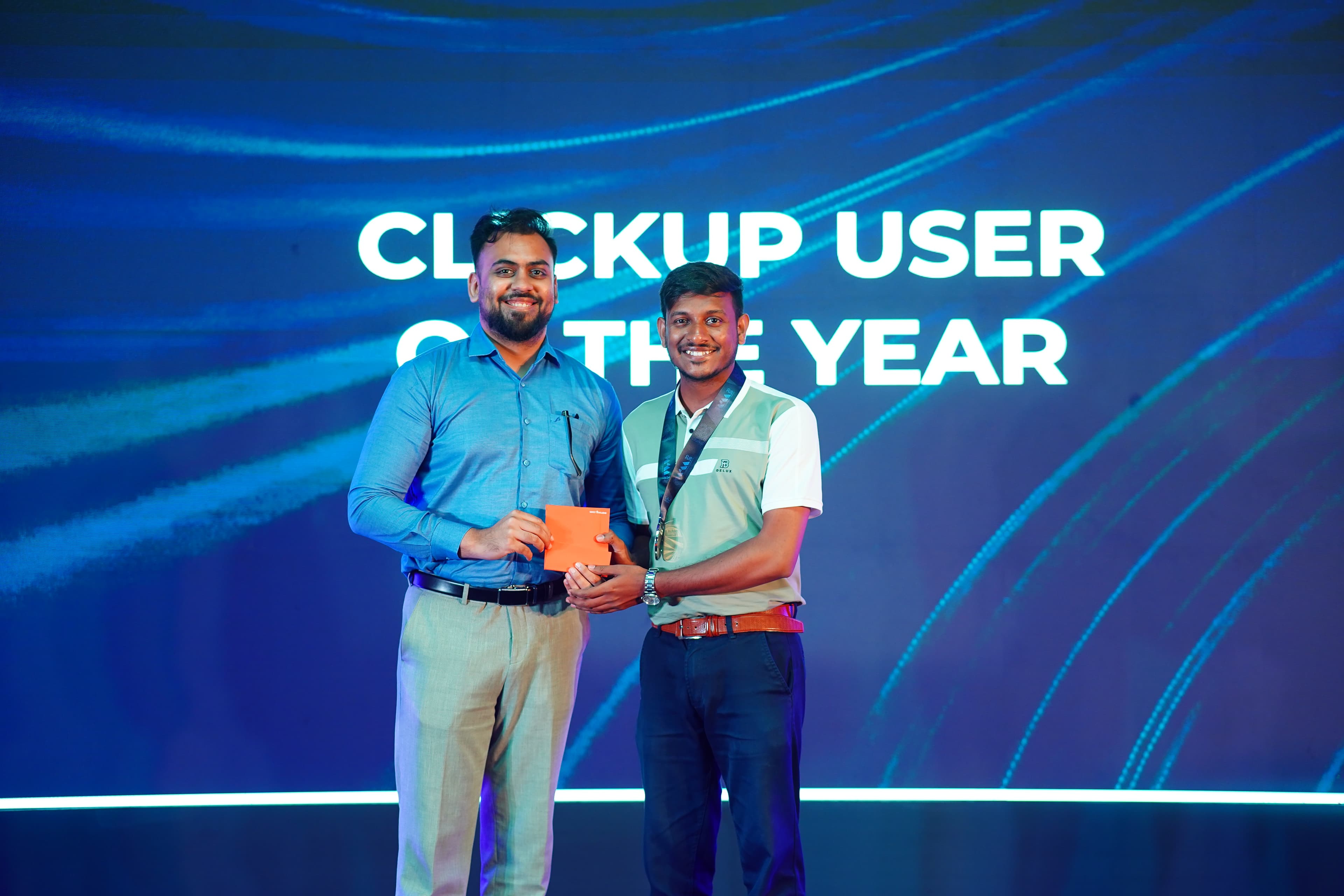 Receiving ClickUp User of the Year from leadership